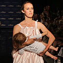 Model at Fashion Runway Show 2017 Breastfeeding on Stage