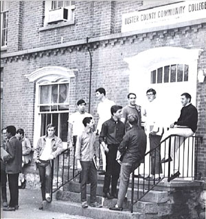 Black anmd white photo of Male students chatting on Kingston Campus 1963