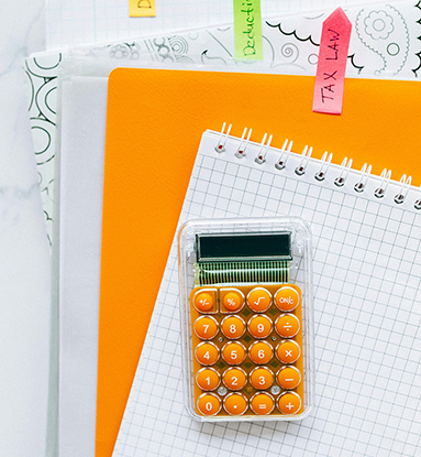 colorful calculator and papers