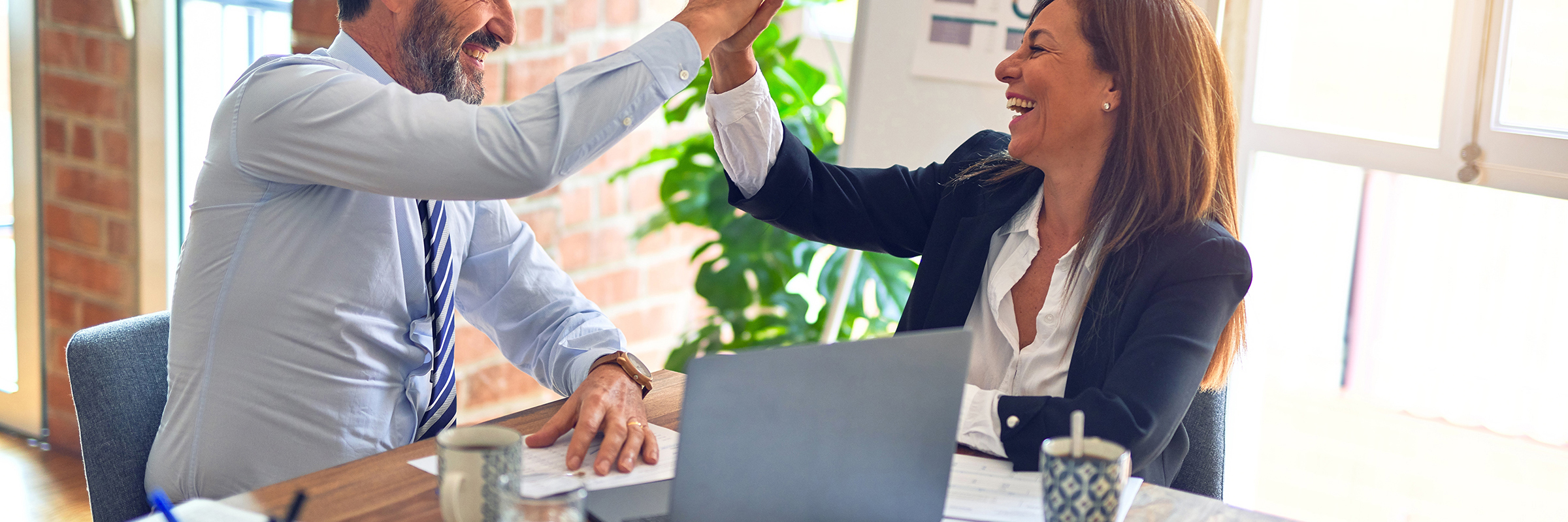 business people high-fiving