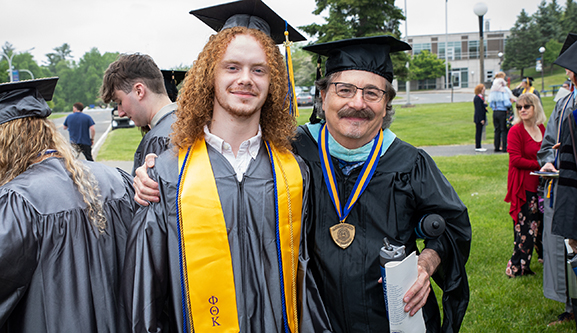 Jim Hobbs with student at graduation 