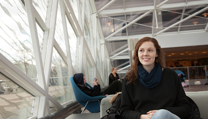 red-haired woman smiling 