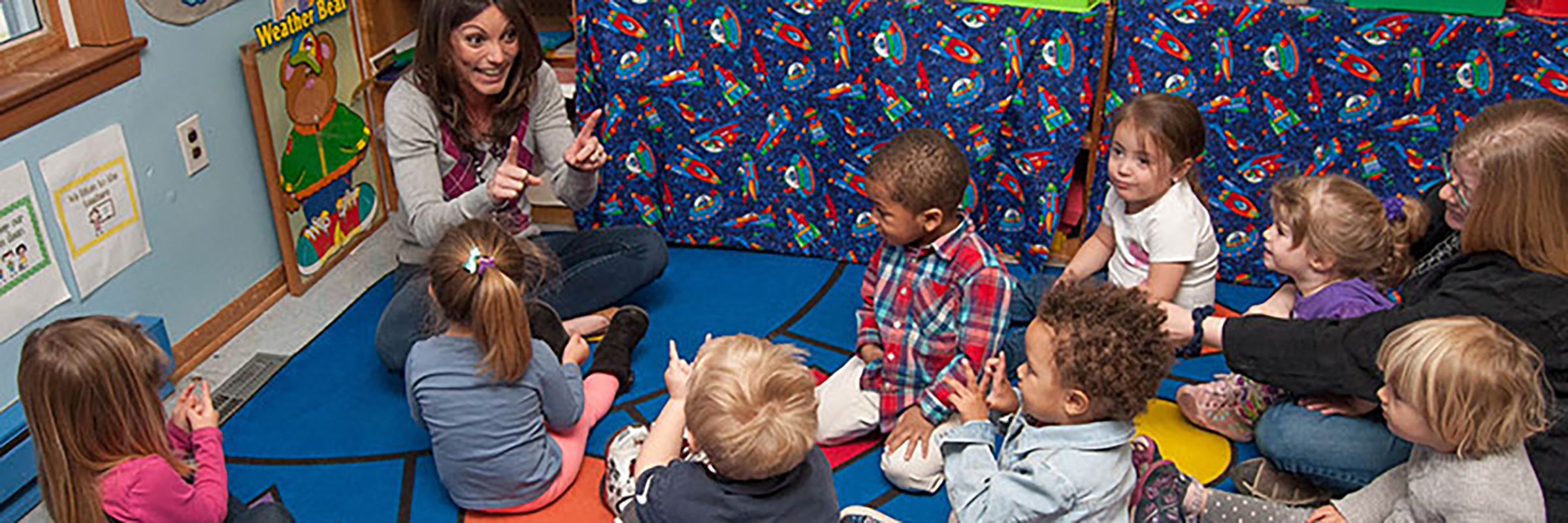 small children learning with teacher