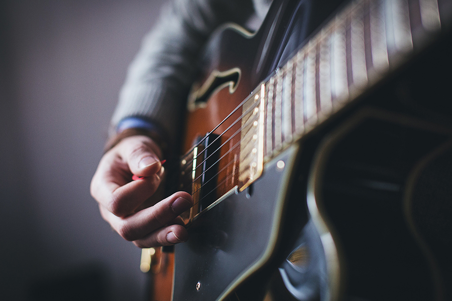 guitar and hand up close