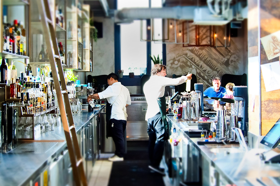 bar with two bartenders