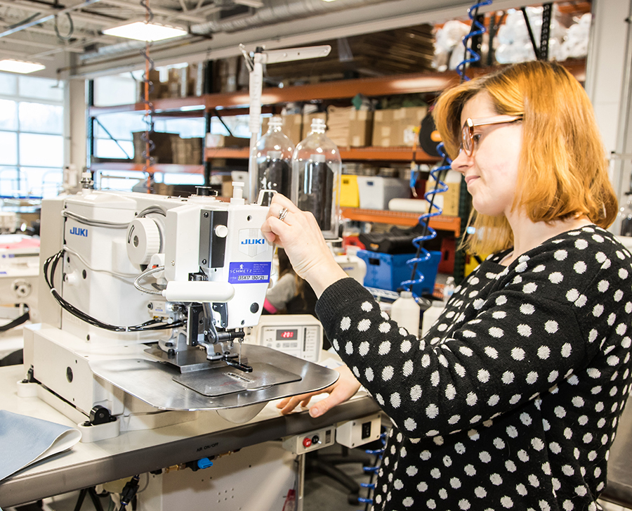 woman at industrial sewing machine