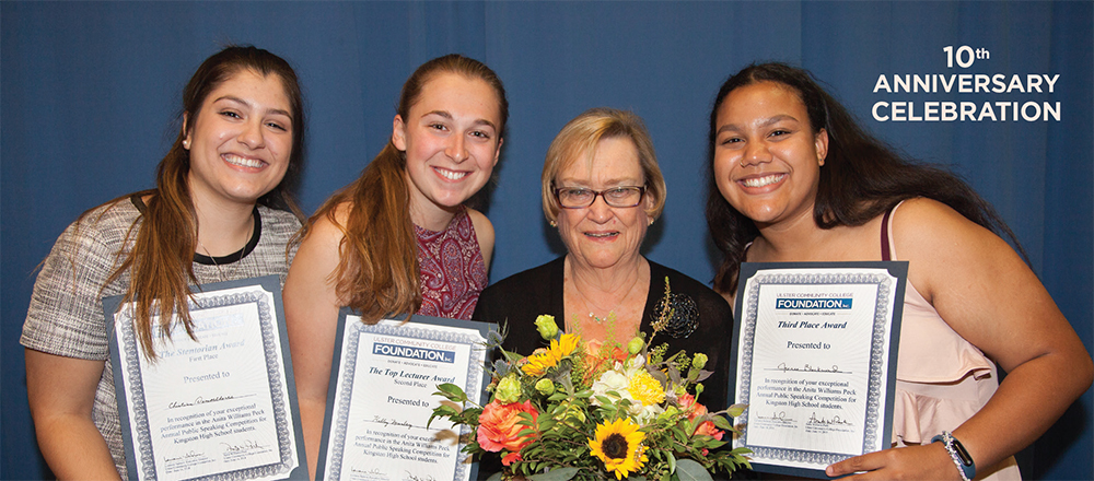 4 women posing with awards