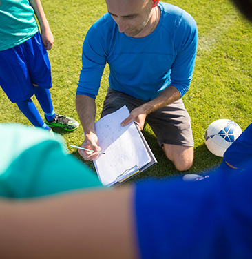 coach on soccer field