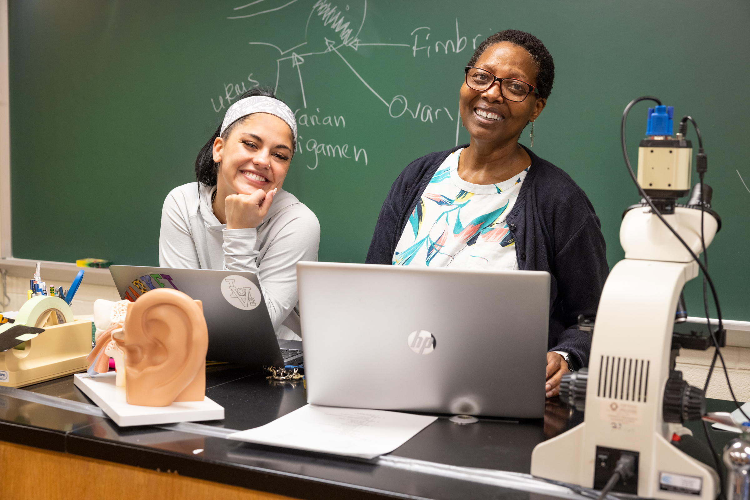 teacher, student and blackboard